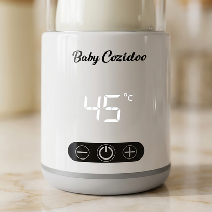 Close-up of the Babycozidoo bottle warmer LED display showing 45°C — precise feed-temperature control with three touch buttons